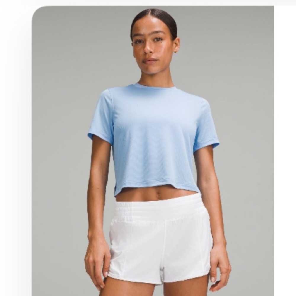 Light Blue Lululemon ultralight weight length t-shirt size 4